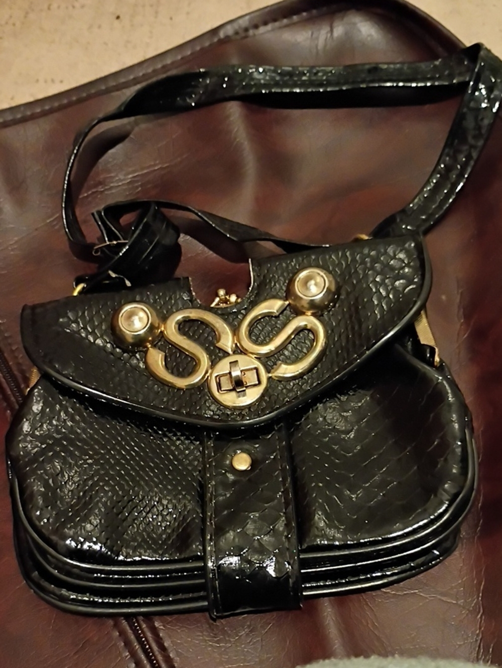Black Faux-Snakeskin Shoulder Bag with Gold Accent Hardware